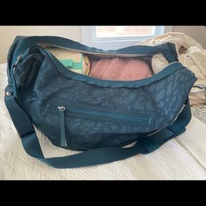 Lululemon teal crossbody gym (or overnight) bag